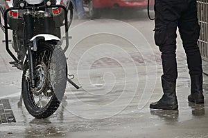 Motorcycle Car Wash Motorcycle Make more clean. A series of photos a biker washes his motorcycle at the car wash