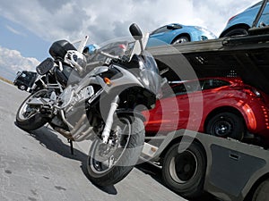 Motorcycle and cars