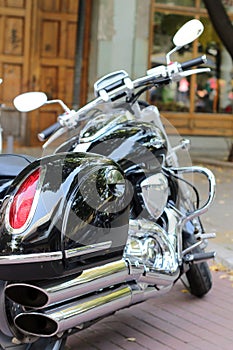 Motorcycle chrome exhaust and engine closeup