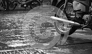 MOTORCYCLE AND CLOSE-UP OF RAINDROPS