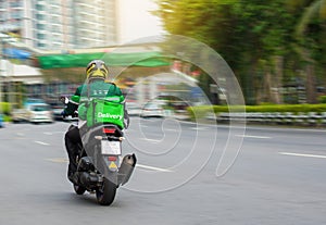 Motorcycle drivers deliver food to customers who order online.