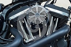 Motorcycle engine close-up detail on wall background