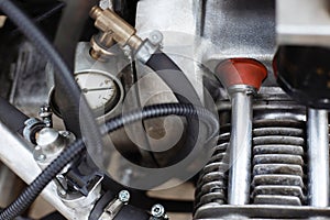 Motorcycle engine cylinder closeup detail. Customizing, repair