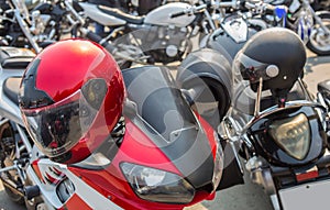 Motorcycle helmets on the handlebars of a motorcycle