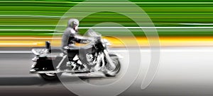 Motorcycle on the highway. Abstract background.