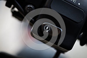 Motorcycle ignition button