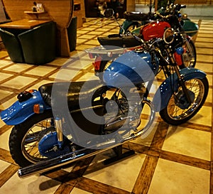 Motorcycle `Java`, which is an undefined element of the design of a pub or bar