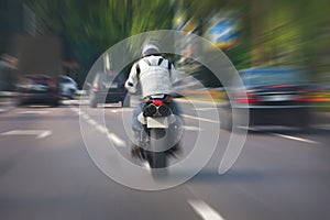 Motorcycle moves on the city road
