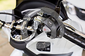 Motorcycle handlebar idling stop on-off button,Close up