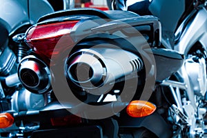 Motorcycle pair exhaust pipes close-up