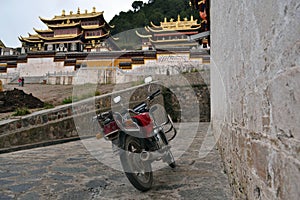 A motorcycle parked in front of Serti Gompa Monastery in Langmusi, Amdo Tibet. Pic was taken in September 2017.