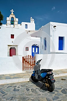 Motorcycle parked near orthodox christian church