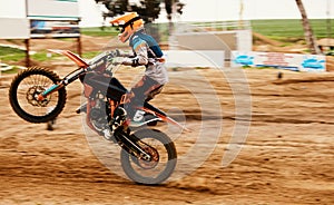 Motorcycle, power and motion blur with a sports man on space for dirt biking race or challenge. Bike, fitness and speed