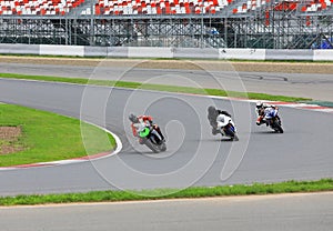 Motorcycle racers on the race track