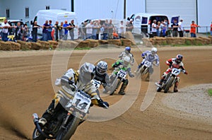 Motorcycle racers on the turn