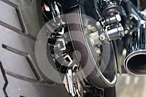 Motorcycle rear belt drive at garage, belt drive reduces maintenance and quieter than chains. maintenance,repair motorcycle