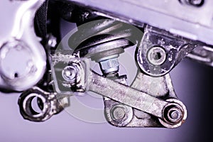 Motorcycle rear suspension linkage photo