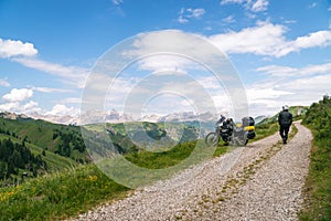 Motorcycle rider enjoy the momment. Touring adventure motorbike on the top of mountain, enduro, off road, beautiful view, danger photo