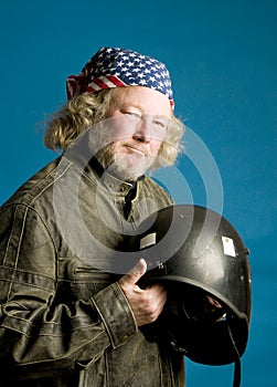Motorcycle rider with helmet American flag bandana
