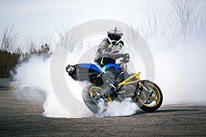 Motorcycle rider performing burnout