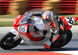 Motorcycle rider on sharp turn