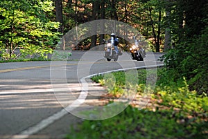 Motorcycle riding on forest road