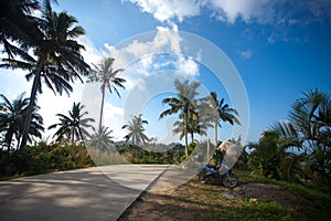 Motorcycle at road on top mountains of Koh Samui