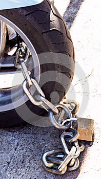 Motorcycle secured with padlock