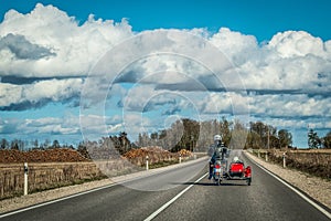 Motorcycle with sidecar on country roads