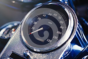 Motorcycle speedometer on the open road