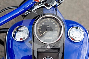 Motorcycle speedometer on the tank with chrome details