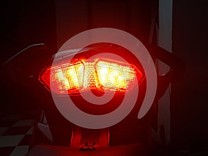 Motorcycle taillights Looks like a face,Bike taillight glowing red