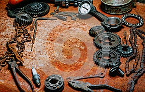 Motorcycle tools, equipment and repair, chain, gearÑ– on vintage metal background