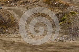 Motorcycle tracks in sand. Sport trails for training in a sand dune