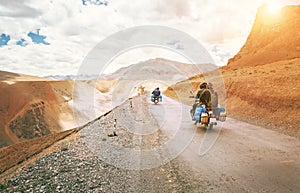 Motorcycle travelers ride in indian Himalaya roads photo