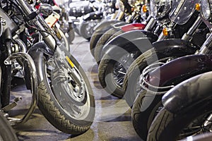 Motorcycle wheels close up view in warehouse for bike safekeeping at winter season