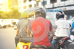 Motorcycles with helmets waiting green traffic light in transportaion safe concept photo