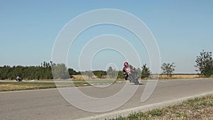 Motorcycles on racetrack.