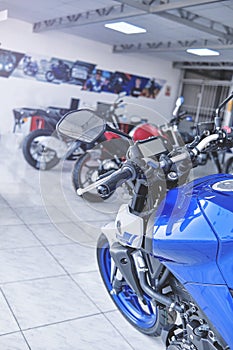 Motorcycles in the showroom Yamaha shop. Yamaha MT03 motorcycle, selective focus