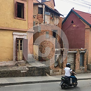 Motorcycling in the street of Antananarivo, capital of Madagascar photo