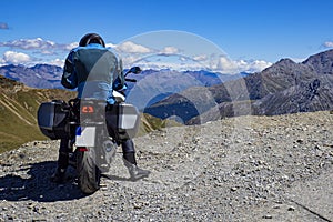 Motorcyclist in the alps in summer