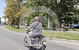 Motorcyclist biker driving on the highway