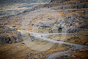 Motorcyclist descends Healy Pass in Ireland