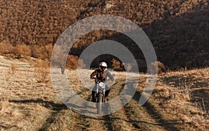 Motorcyclist Driving Along A Winding Road. Extreme sport.