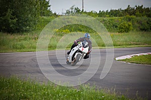 Motorcyclist enters a turn