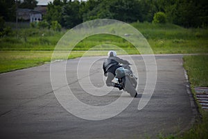 Motorcyclist enters a turn