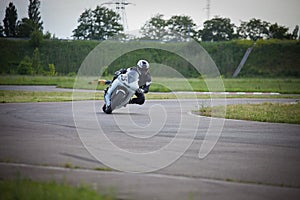 Motorcyclist enters a turn