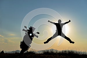 Motorcyclist jumping at sky