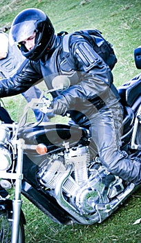 Motorcyclist on motorcycle photo