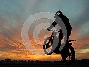 Motorcyclist in sunset